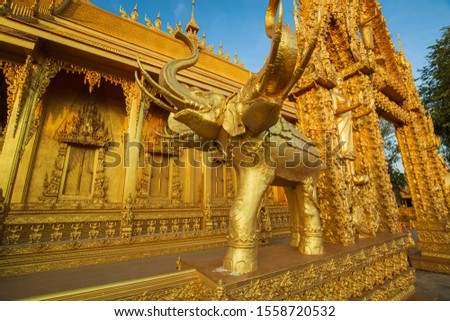 Temple gold color beautiful art elephant and architecture in at Wat Paknam Jolo,Bangkhla,Chachoengsao Province,Thailand
