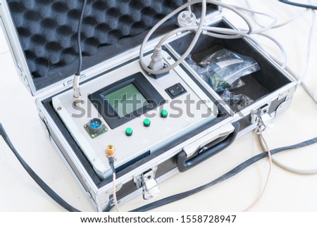 Suitcase with a gastroscope and a light source Pentax LH-150 PC in a modular tent of the field hospital Royalty-Free Stock Photo #1558728947