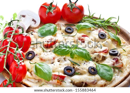 Pizza with ham, salami and olives 