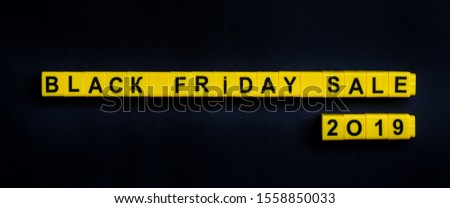 Black friday sale word on the black background with free place for your text.