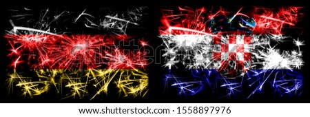 Germany, German vs Croatia, Croatian New Year celebration travel sparkling fireworks flags concept background. Combination of two abstract states flags.
