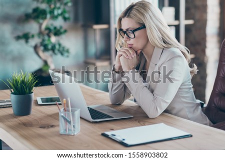 Profile photo of beautiful business lady resourceful person looking seriously notebook table watching online training minded sit chair formalwear blazer modern office Royalty-Free Stock Photo #1558903802