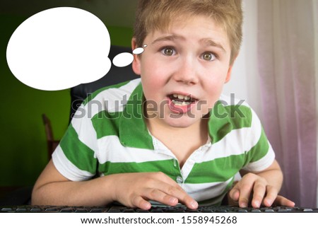 Funny picture with bubble idea little boy looks into screen at computer.