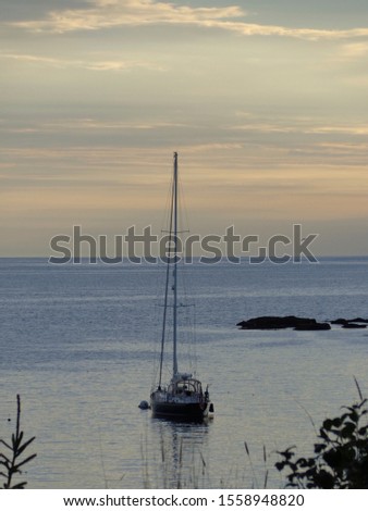   A sail boat at anchor                             
