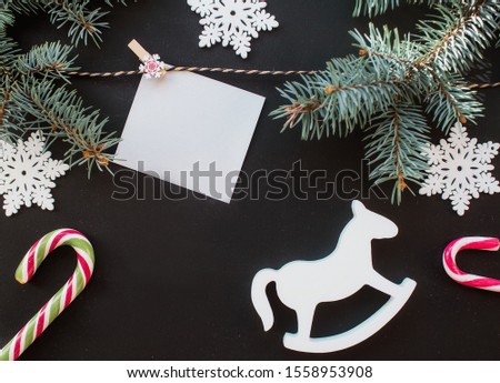 
Happy New Year 2020, background decoration, top view on pine branches with cones, toys, letters. Flat lay. Copy space.
