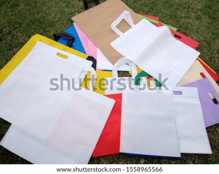 Different types and size of Eco Friendly Bags, Non Woven Bags, Multi Color Bags on White Background