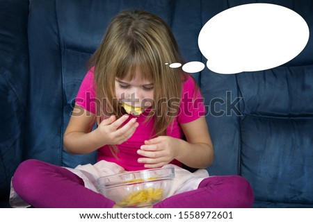 Funny picture with bubble idea little girl is eating chips.