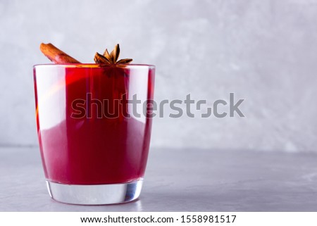 Mulled wine on cement background. Copy space