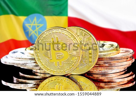 Concept for investors in cryptocurrency and Blockchain technology in the Ethiopia and Poland. Bitcoins on the background of the flag Ethiopia and Poland.