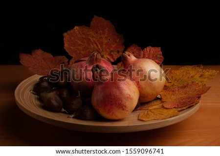 Still life photos of typical autumn fruits and vegetables in a warm and cozy mood