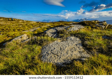 Beautiful mountains landscape of Scotland nature with beautiful evening cloudy sky.