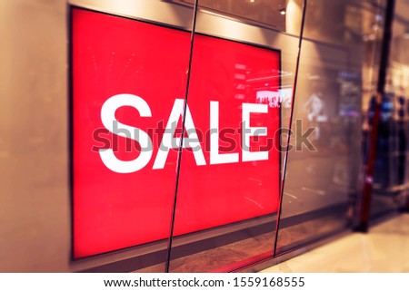 Advertising signs for sale in department stores. Store window with sale sign. Clearance Sign. Sale banner in shop window. Sign, Commercial Sign, Customer, For Sale 