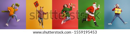 Merry Christmas! Happy children and Santa Claus on multicolor background.