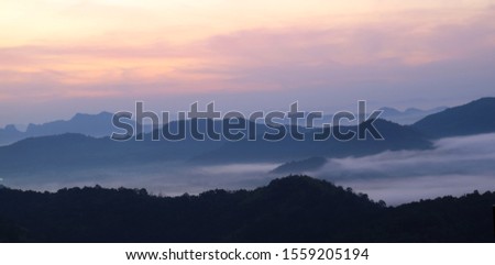 The view of the winter mist and the morning sunrise,copy space background