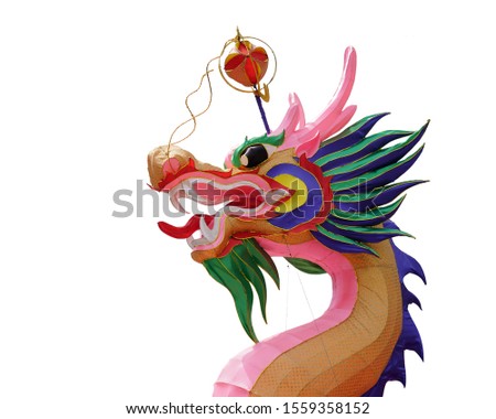 Lamp puppet dragon head isolated on white background. This has clipping path. 