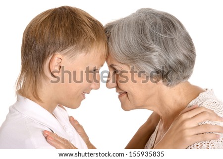 Granny hugging his grandson on white background