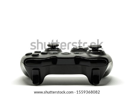 Wireless game controller, isolated from white background.
