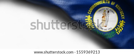 Fabric texture of the Kentucky Flag background - flag on white background - right top corner - free copy space