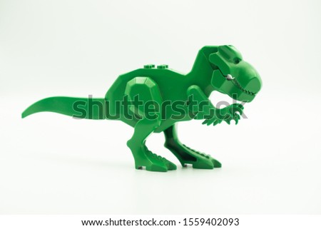 T-Rex toy dinosaur, baby toy, isolated on white background, design element