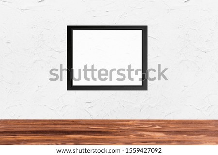 Photo Frame on White Concrete & Wood Floor Background