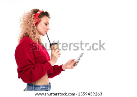 Caucasian girl with curly fair hair drinks coffe, listen to music and talking with friends, portrait isolated on white background