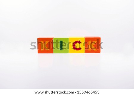 KICK word made with building colored blocks