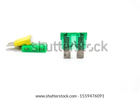 Automotive fuse size 30 amp with open circuit used to protect the wiring and electrical equipment for vehicles isolated on white background.Blown fuse Royalty-Free Stock Photo #1559476091