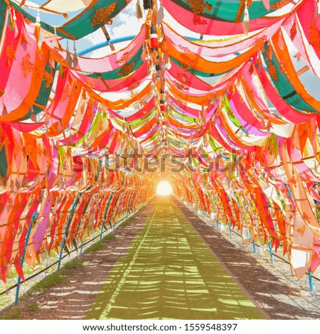 Colorful Paper Tunnel festival sidewalk of passage traditions of Thai Buddhists in northern Thailand