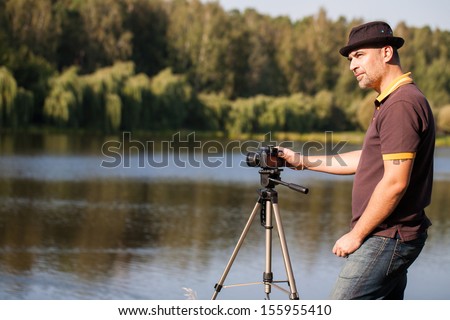 Nature or Bird Photographer near the lake