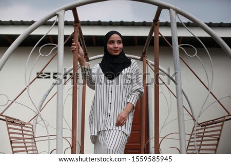 Potrait of young beautiful muslim women posing wearing blouse