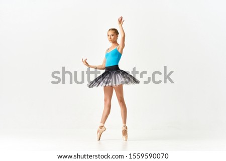 Woman ballerina dance exercise plasticity gymnasium