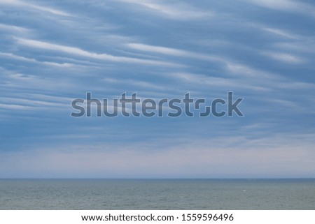 gray rain clouds over the sea
