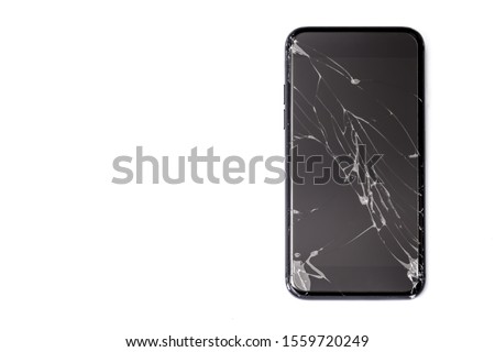 cracked or broken screen of smartphone or tablet on white background
