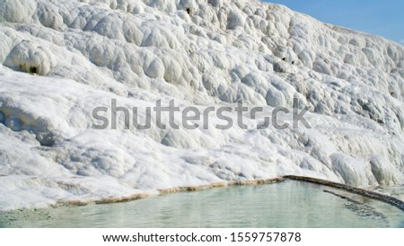 Natural travertine pools and terraces in Pamukkale. It is on the World Heritage List and is under protection.