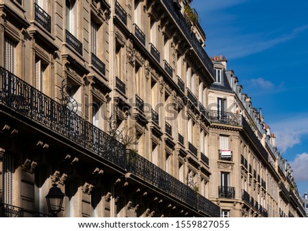 Paris Town Houses with typical old facades from th 19th Century, real estate high class apartmens in best location