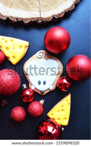 red Christmas decorations with mouse and cheese