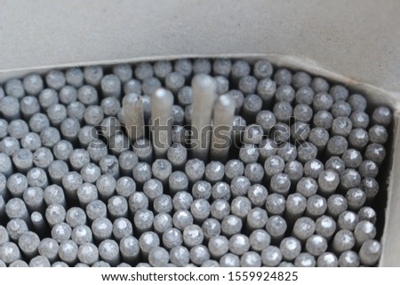 Small steel Welding rods(1.6 mm.) arranged in a box. It is suitable for welding thin steel