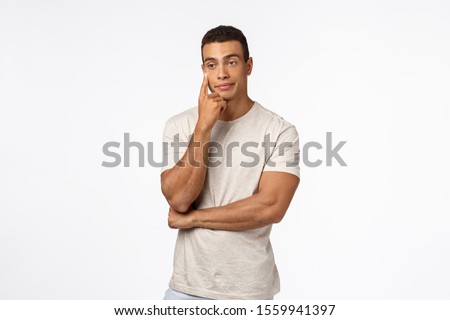Annoyed and bothered arrogant man, smirk irritated look spaced out, touching face with finger, cant stand boring meeting, feeling boredom and disappointment, standing thoughtful white background