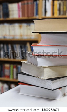 Stack of books in library_
