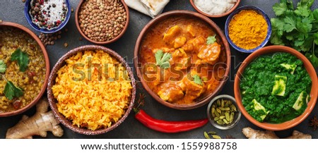 Border variety of Indian dishes. Traditional Indian Food Set. Top view, flat lay Royalty-Free Stock Photo #1559988758