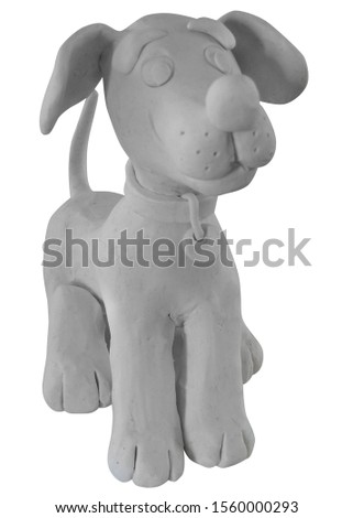 Colorless happy cartoon puppy, cute little dog. Dog friend, handmade with plasticine. Isolated on white background – Image