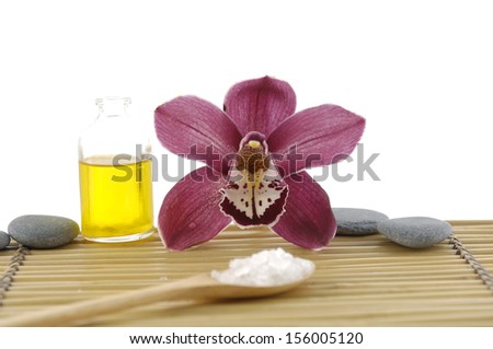 Spa setting with pink orchid ,stone on mat