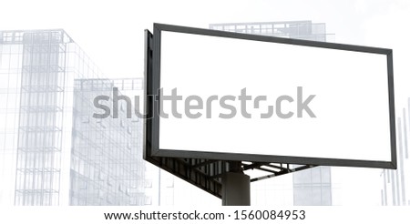 Template of a large blank advertising billboard on a blurred background of skyscrapers