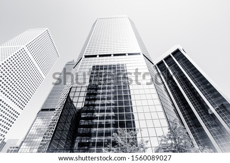 Looking up Denver Colorado Black and white financial district glass building rising straight up