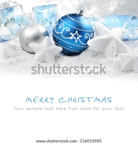 Christmas ornaments on snow,Copy space for your text.