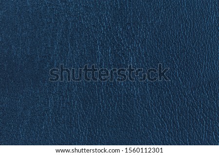 Close up Dark blue leather texture background surface Royalty-Free Stock Photo #1560112301