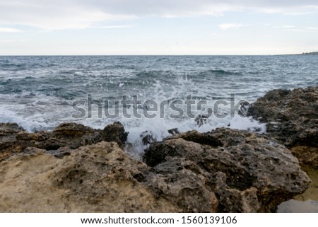Surf and waves on a rocky shore. Cyprus, Protaras