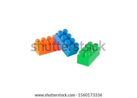 oblong blocks of the children's designer of orange, blue and green on a white background. isolate