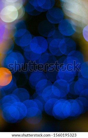 Christmas tree with a creative blur of blue balls