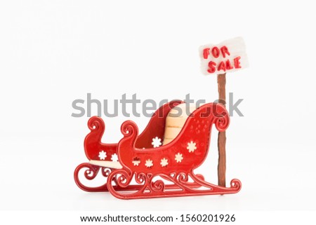  Concept image illustrating making a lifestyle change or retiring, showing a Santa sleigh and a for sale sign.